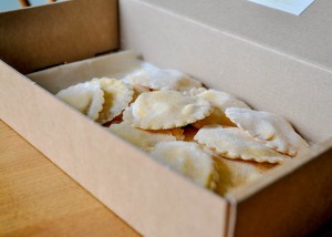 Fresh ravioli filled with ricotta and a hint of orange zest